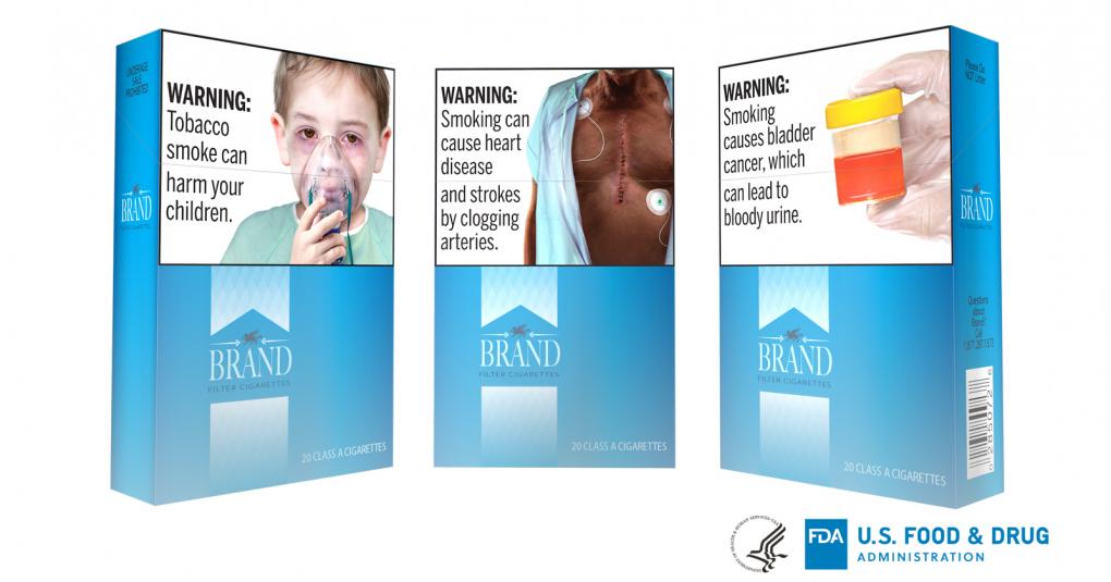 Sample warning labels showing illustrations of a child with an oxygen mask, an man with a heart surgery scar, and a urine sample with blood in it