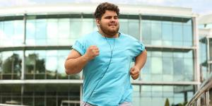 Young man running outdoors