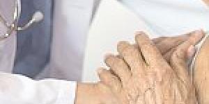 Doctor consoling a patient